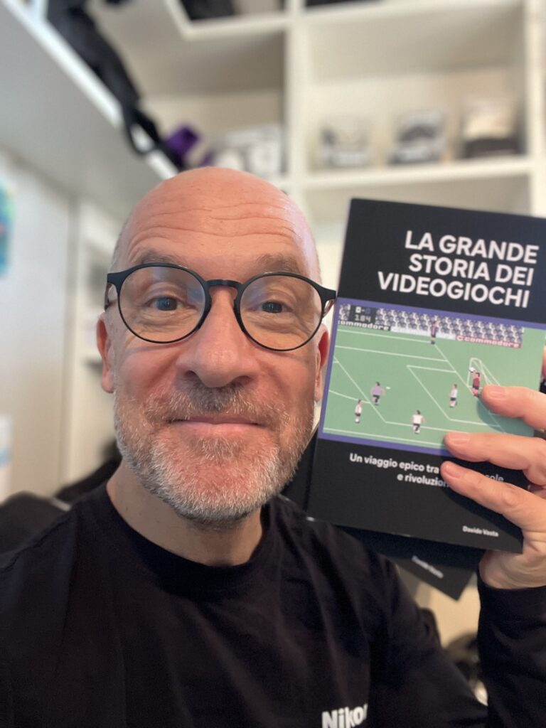 Immagine Davide Vasta e libro La grande storia dei videogiochi